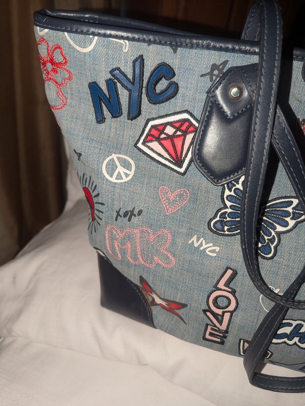 Michael Kors Large Eva Graphic Patchwork Denim Tote Bag with Pouch - Picture 9 of 16